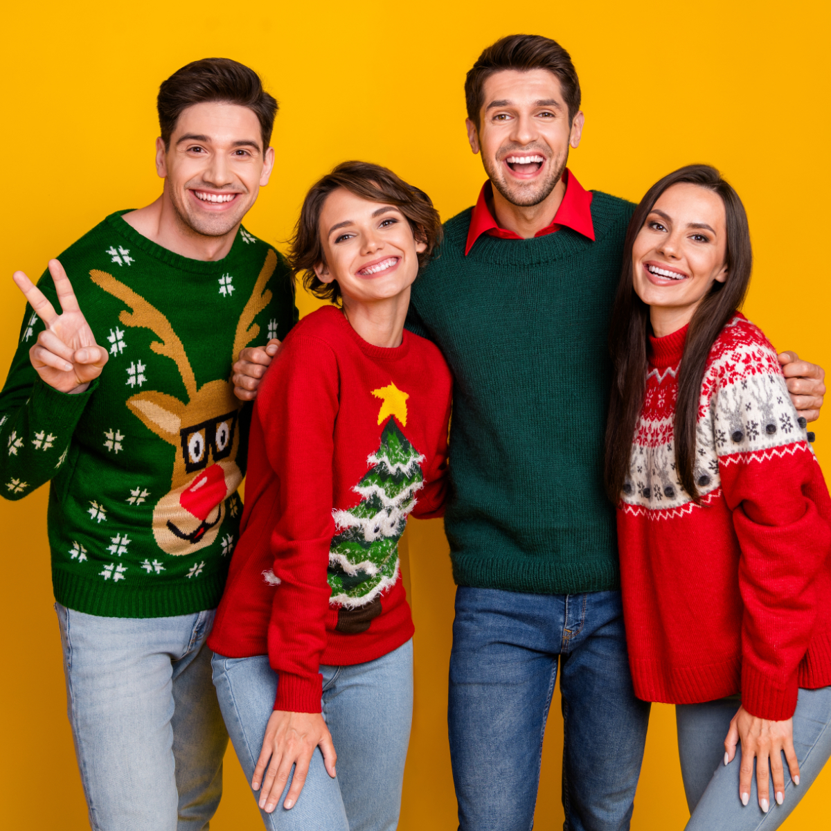group of people wearing holiday sweaters