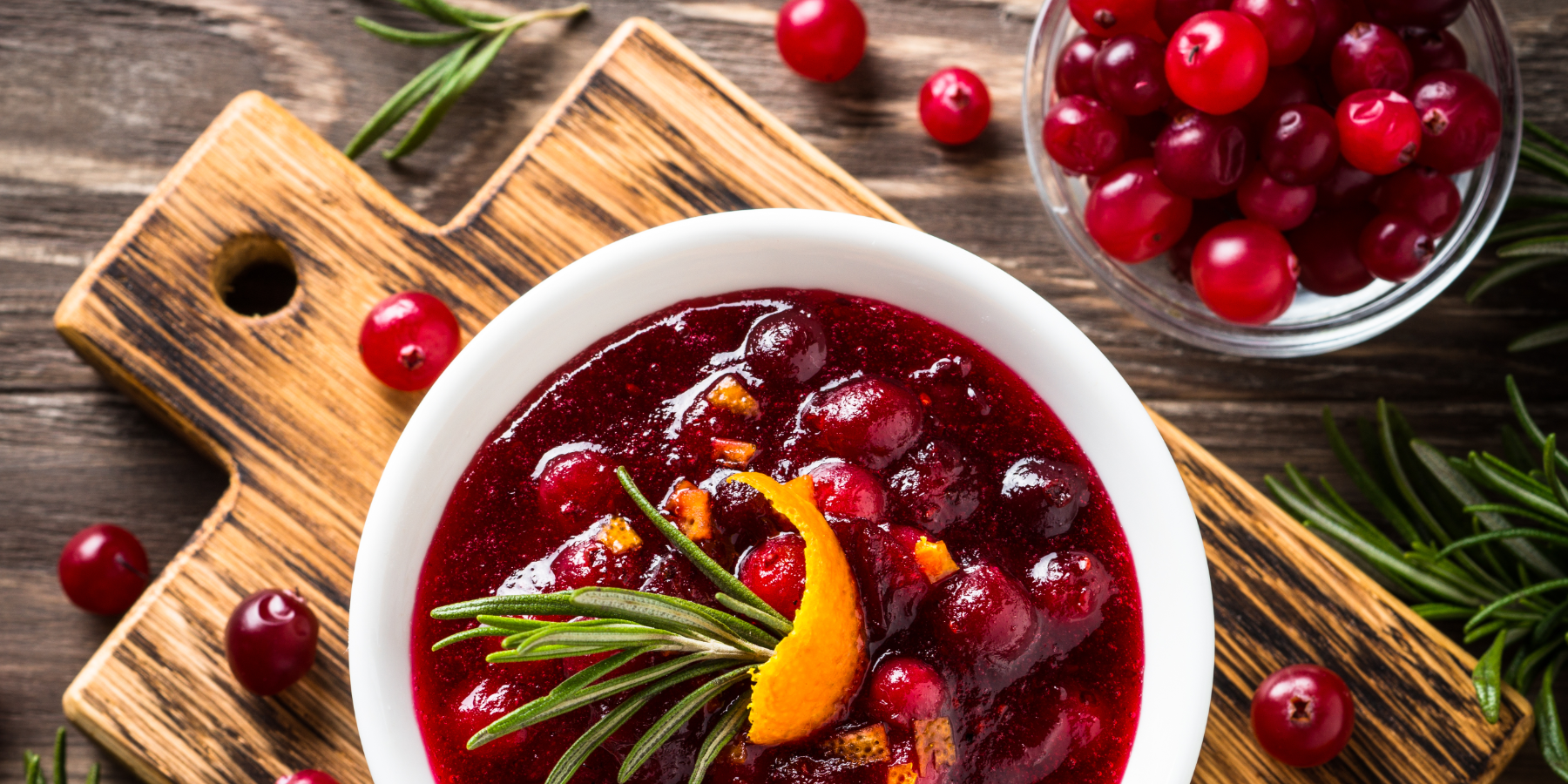 Cranberry Sauce On Plate On Board With Spruce Branches
